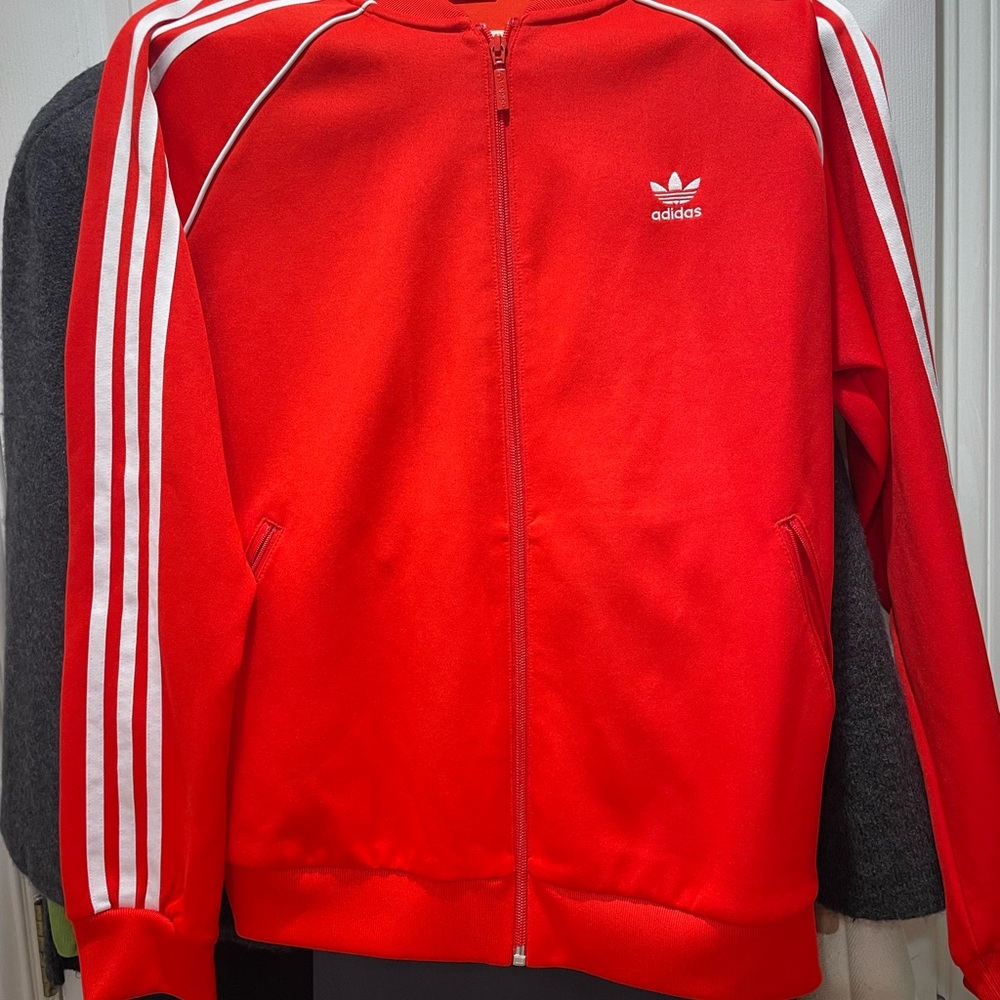 Red Adidas tracksuit jacket